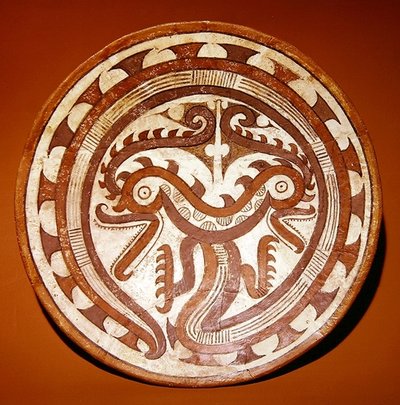 Plate depicting twin crocodile heads on a coiled serpent body, Late Cocle style by Pre Columbian Pre Columbian